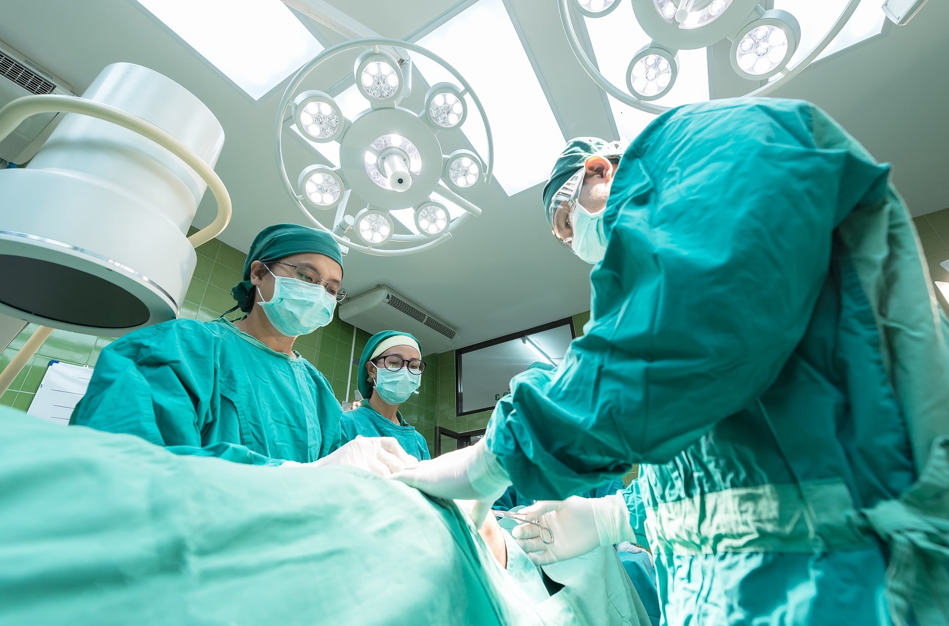 Surgeons doing a surgery in the operating room