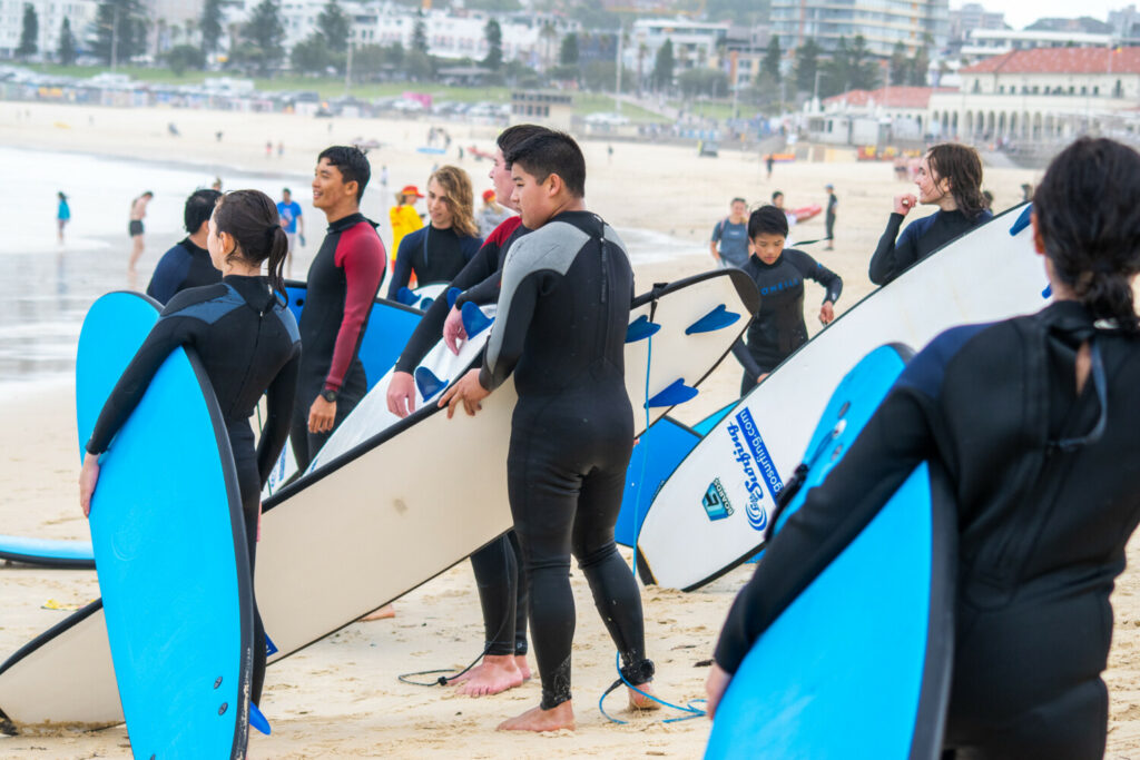 People surfing at Bondi Beach in Sydney, Australia.