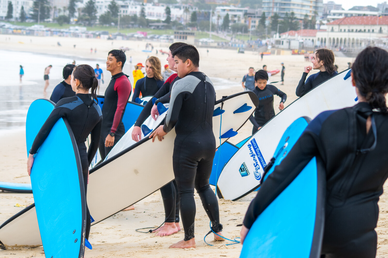 People surfing at Bondi Beach in Sydney, Australia.
