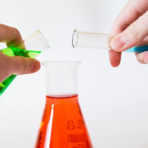 Chemistry flasks with green, red and blue liquids