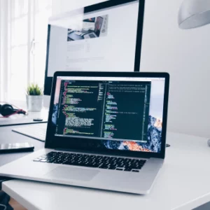 A laptop that shows programming codes.