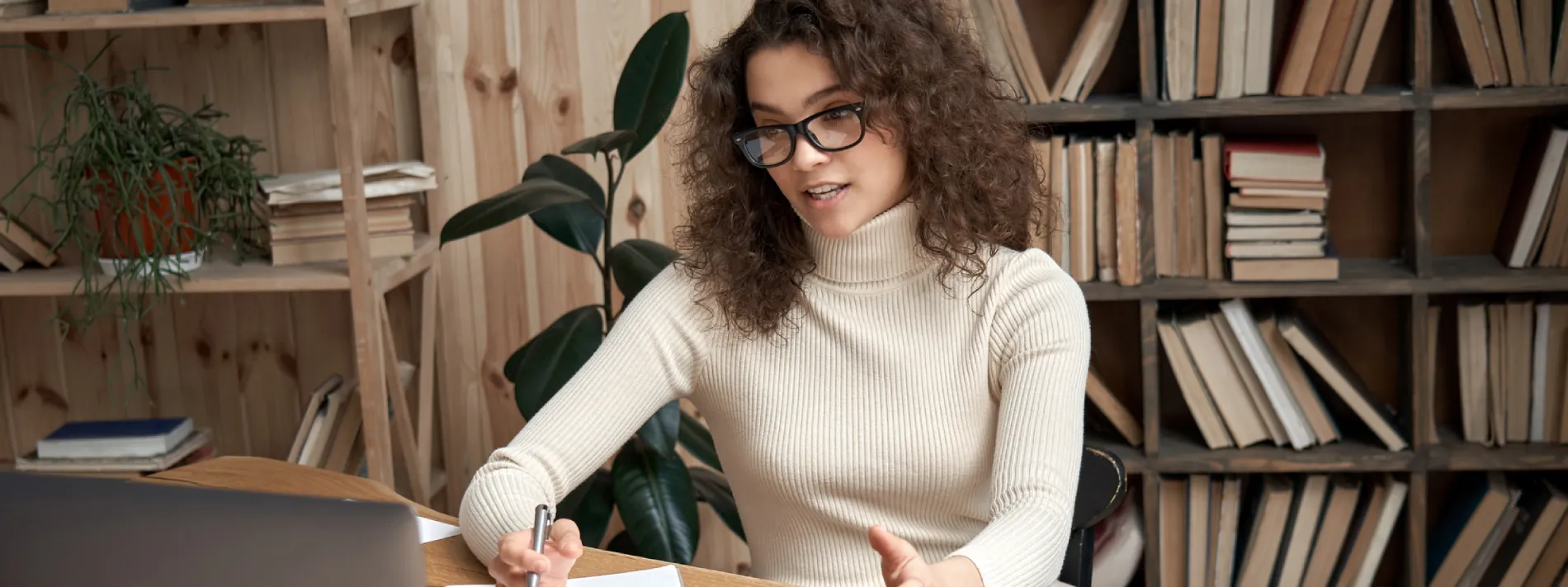 A woman discussing on her laptop