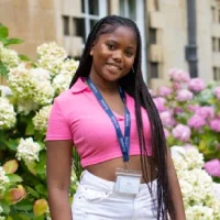 Portrait of Zoe M, a featured individual.