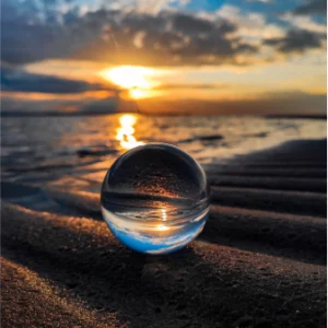 a glass ball on the beach