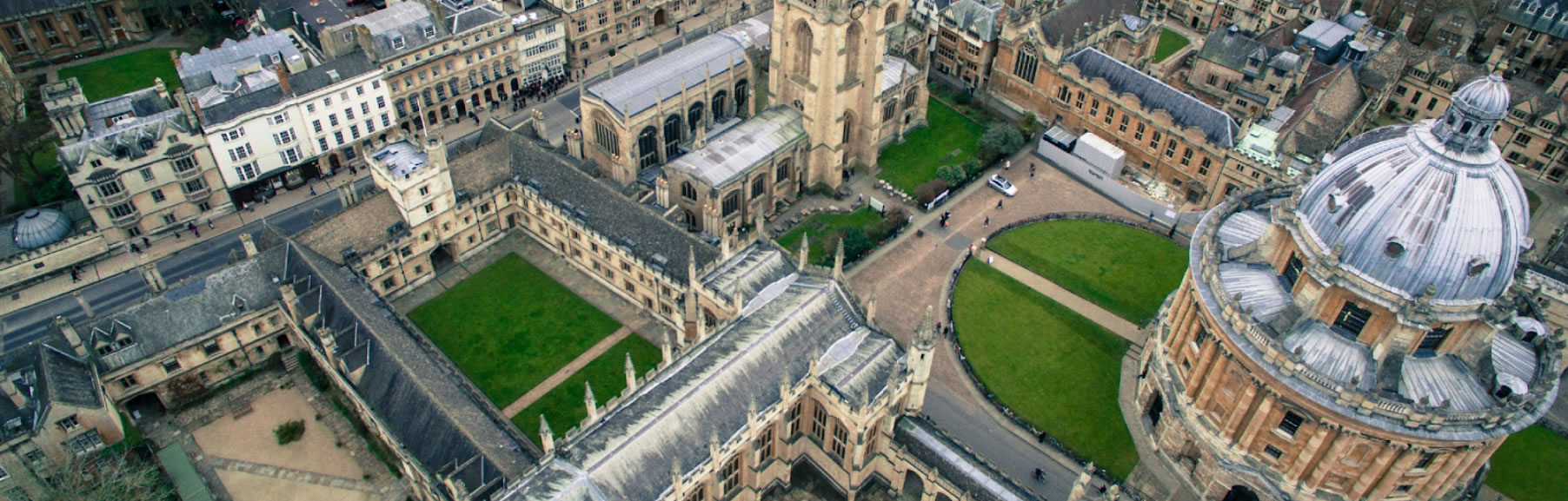 Beautiful historic university campus with grand architecture and green lawns.