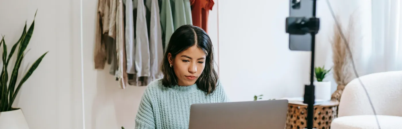 Girl on her laptop in her studio