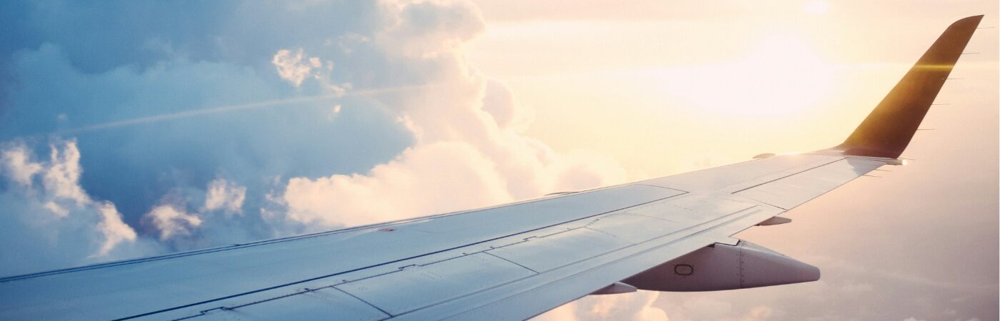 Airplane wing in the sky