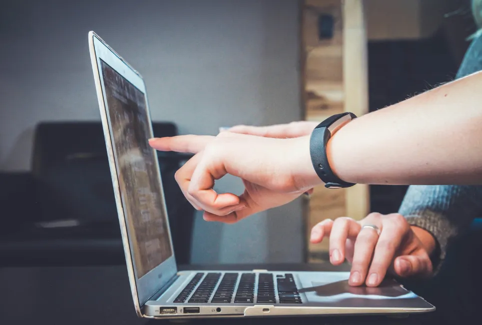 Hand on the laptop