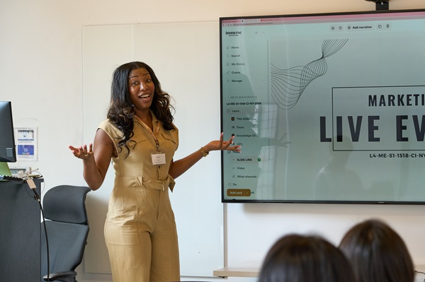 A student presenting a business pitch on Immerse's London Summer Program