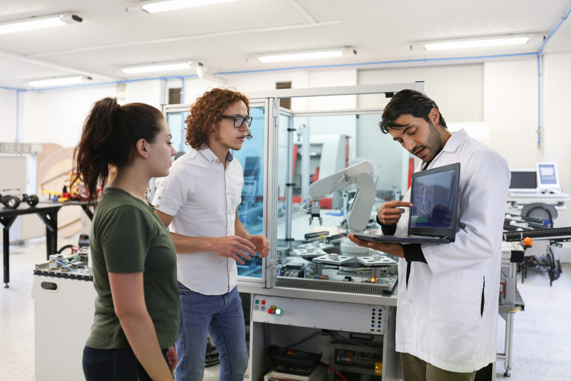 Students exploring AI in a robotics lab