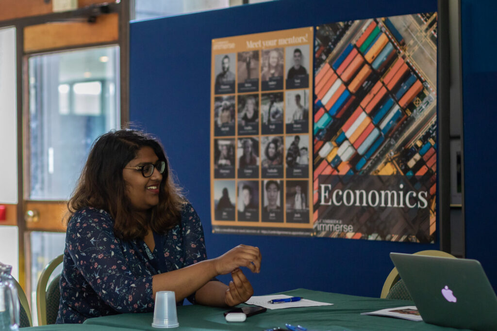 Economics tutor in their classroom