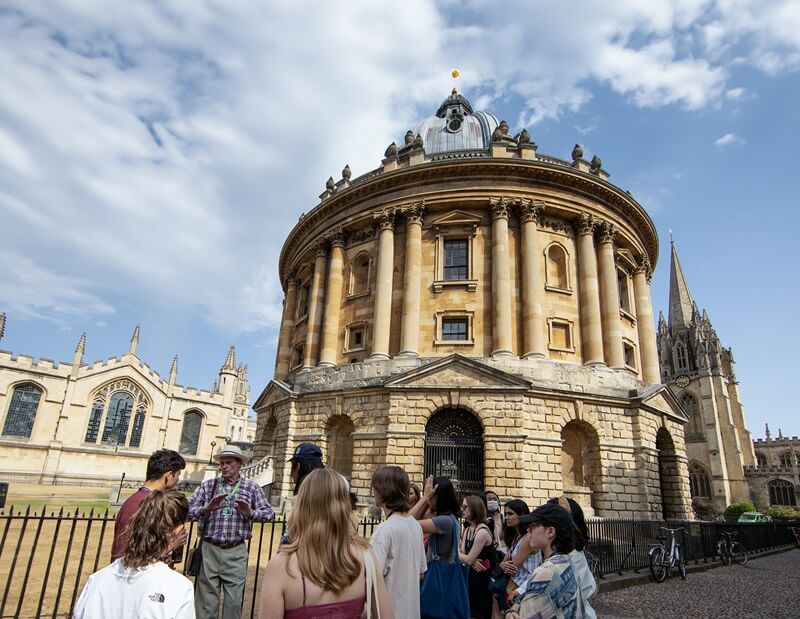Immerse students outside the Bodleian Library at Oxford University